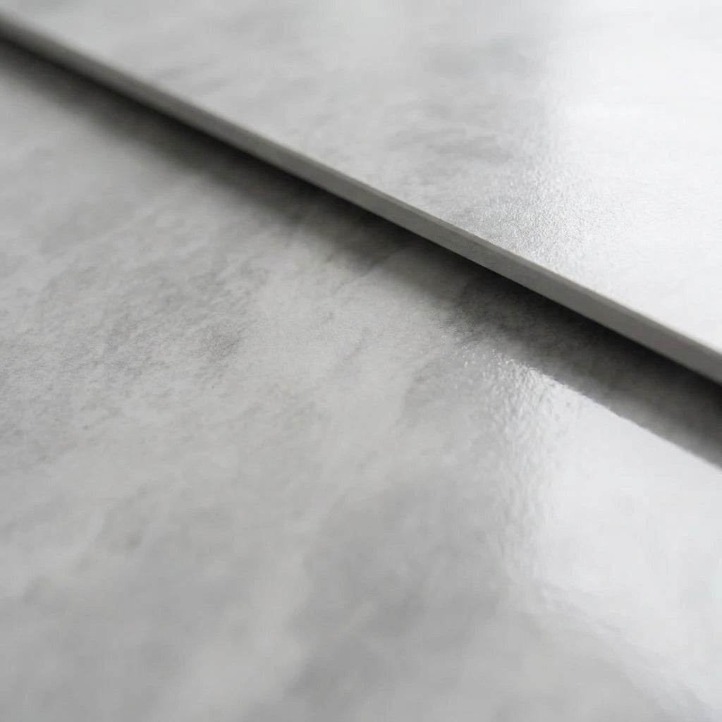 Close up of the high gloss grey sintered stone Benson table top