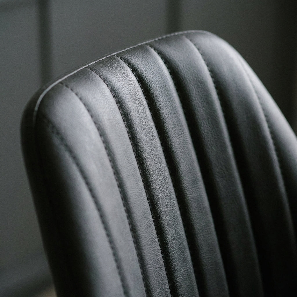 Close up of the horizontal channel stitching on a Benson dining chair back