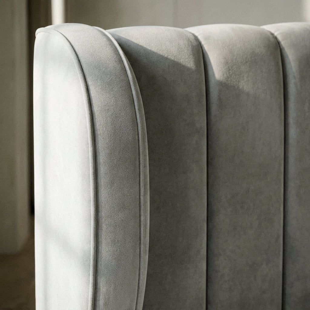 Close-up of the winged channelled headboard on the Zola bed frame