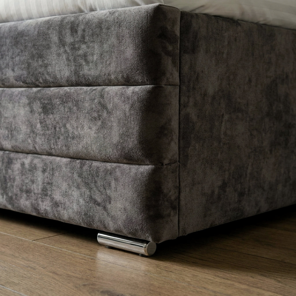Close-up of the crushed velvet divan base and chrome glide on the Sorrento