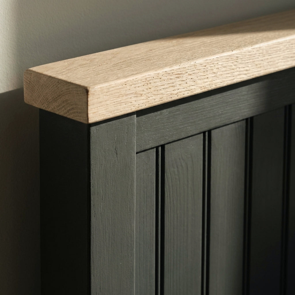 Close-up of the oak top rail and boarded headboard on the Aurora bedframe