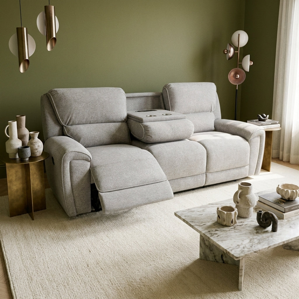 Tyrell reclining sofa in a living room with olive green walls and a cream wool rug