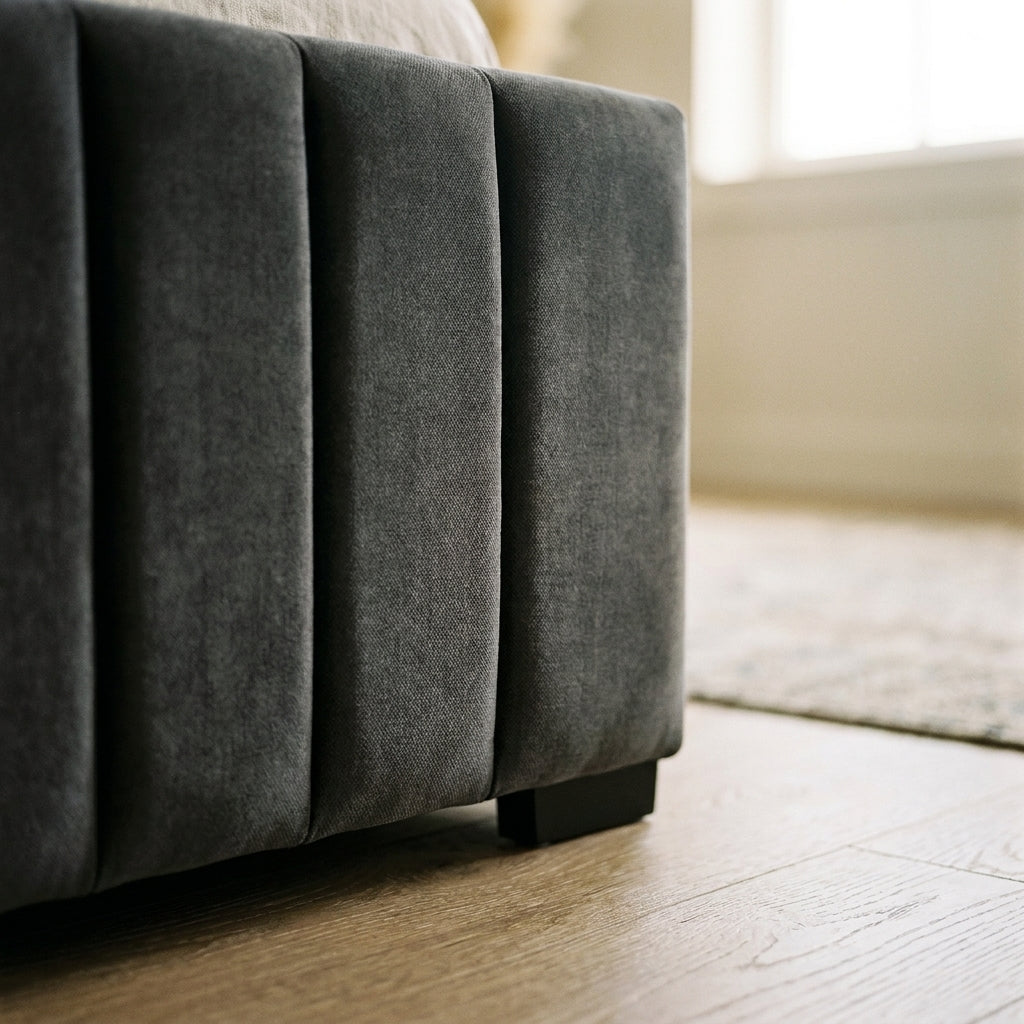 Close up of the fluted base corner and dark foot on the Lisbon ottoman bed