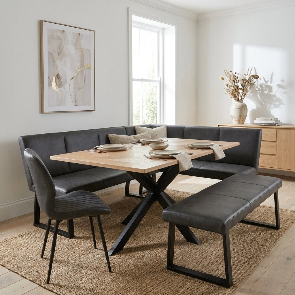 Moore dining set with an L shaped dark leather look corner bench and oak table in a bright white dining room