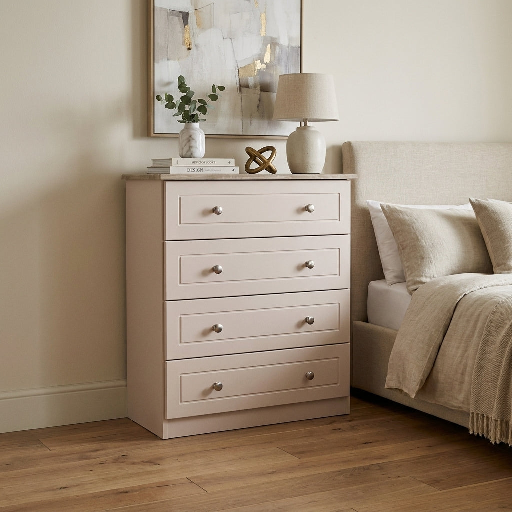 Aurora 4 drawer chest in blush taupe with a wood top, standing against a bedroom wall