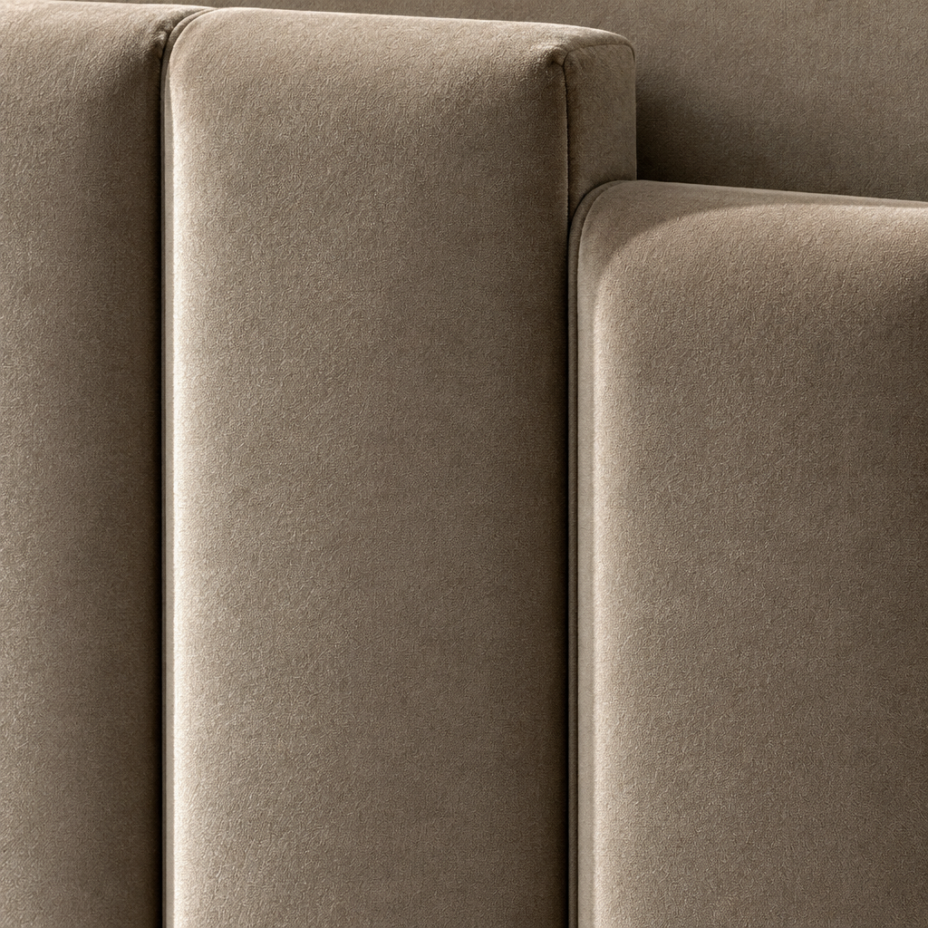Close detail of the Balmoral Bedframe headboard showing the mink velvet vertical channelling and the stepped top edge