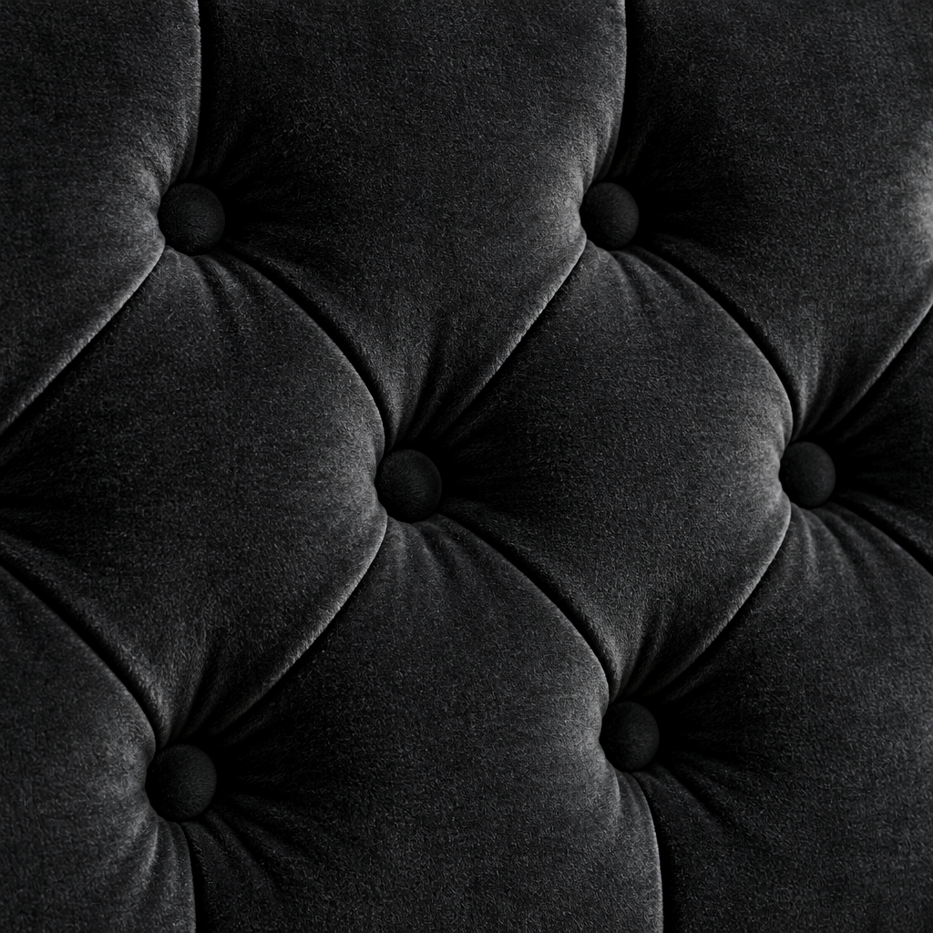 Close detail of the Venus Bedframe near black velvet with deep diamond buttoning