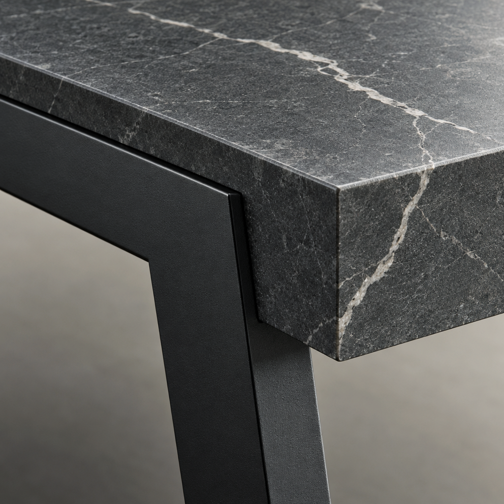 Close detail of the Alpina Coffee Table corner showing the grey marble effect slab and the black splayed metal frame