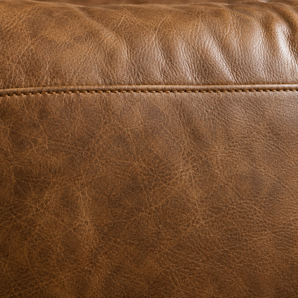 Remy sofa tan leather and stitching detail