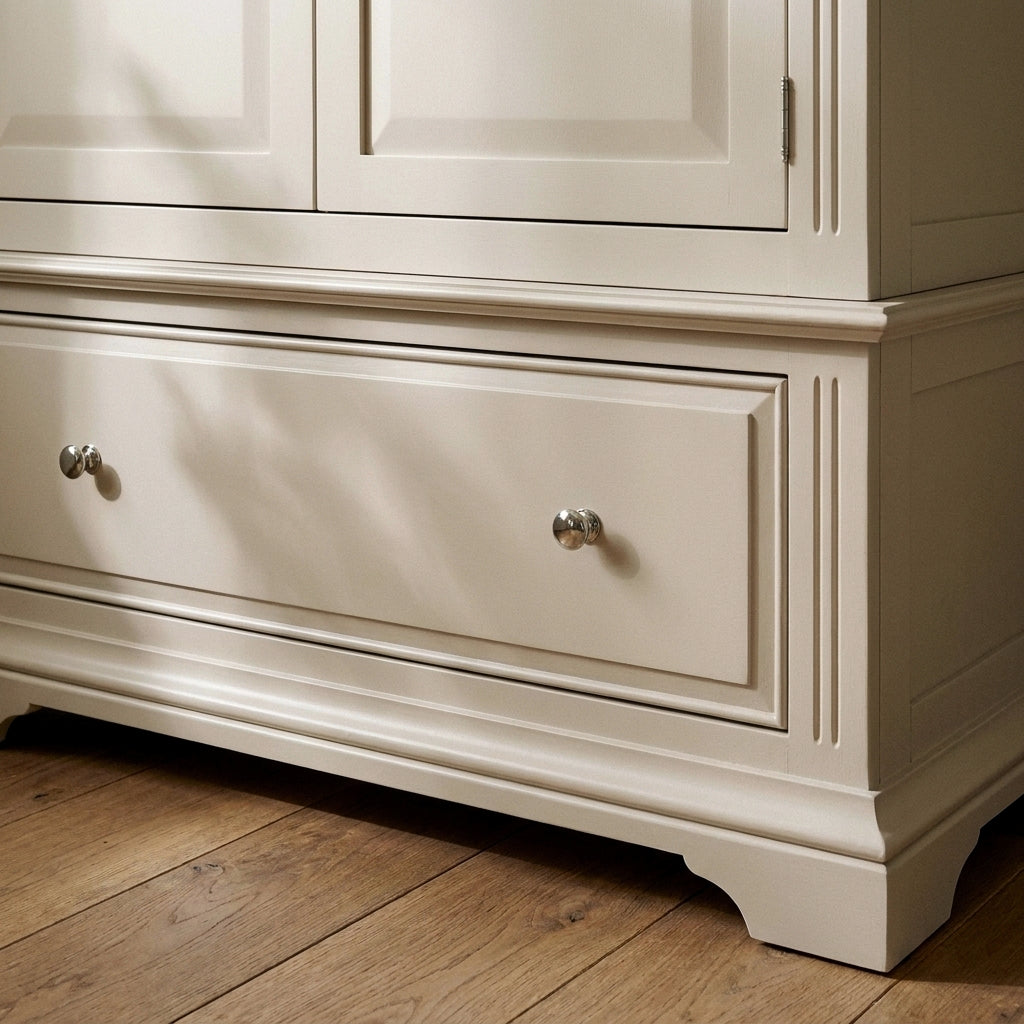 Close-up of the base drawer and moulded plinth