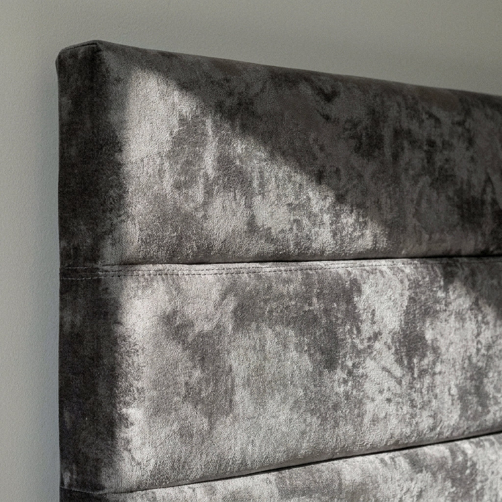 Close-up of the crushed velvet horizontal channelled headboard on the Sorrento