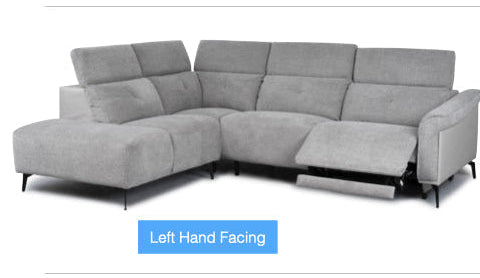 Gray sectional sofa with recliner feature on a white background