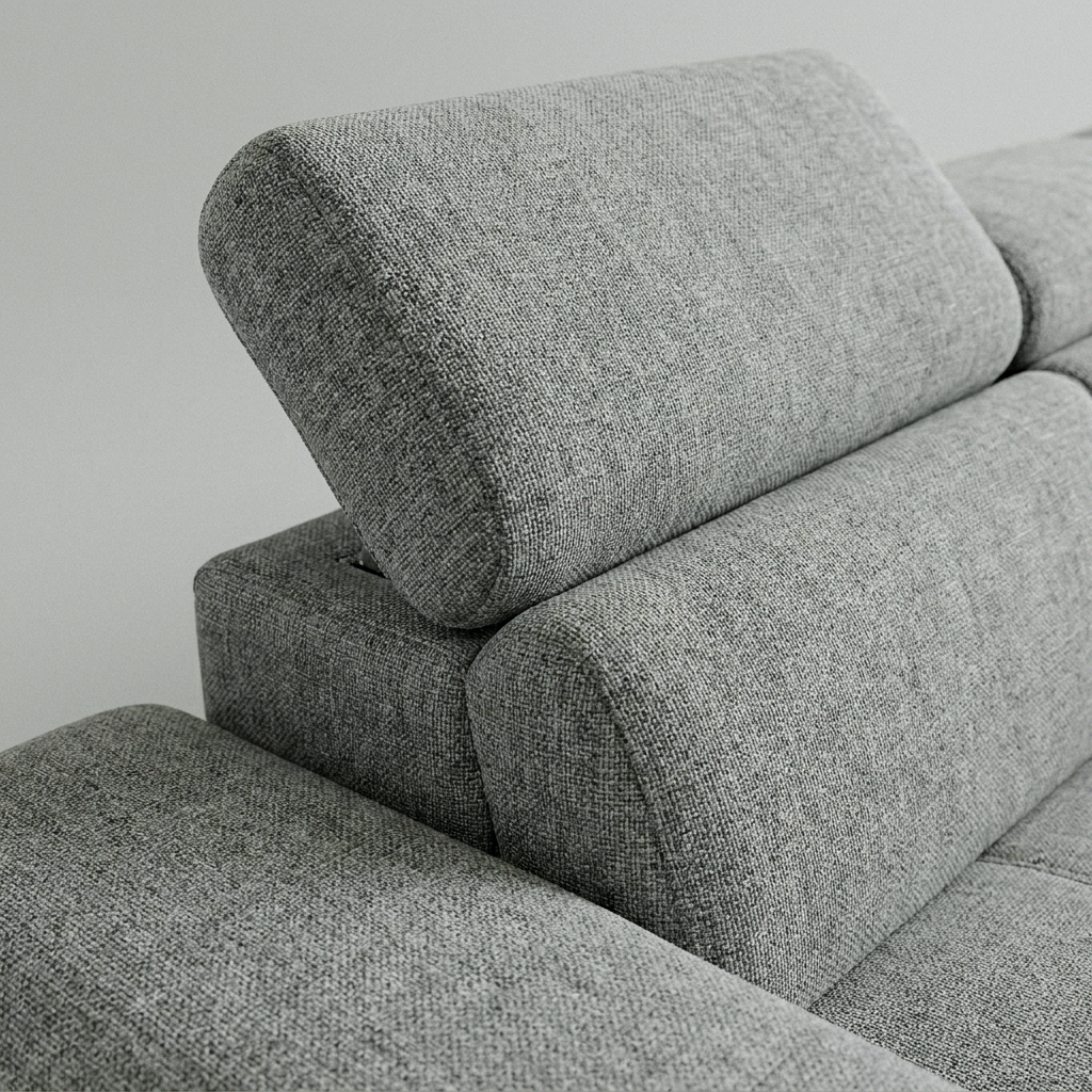 Close-up of an adjustable headrest tilted up on the Bari sofa bed