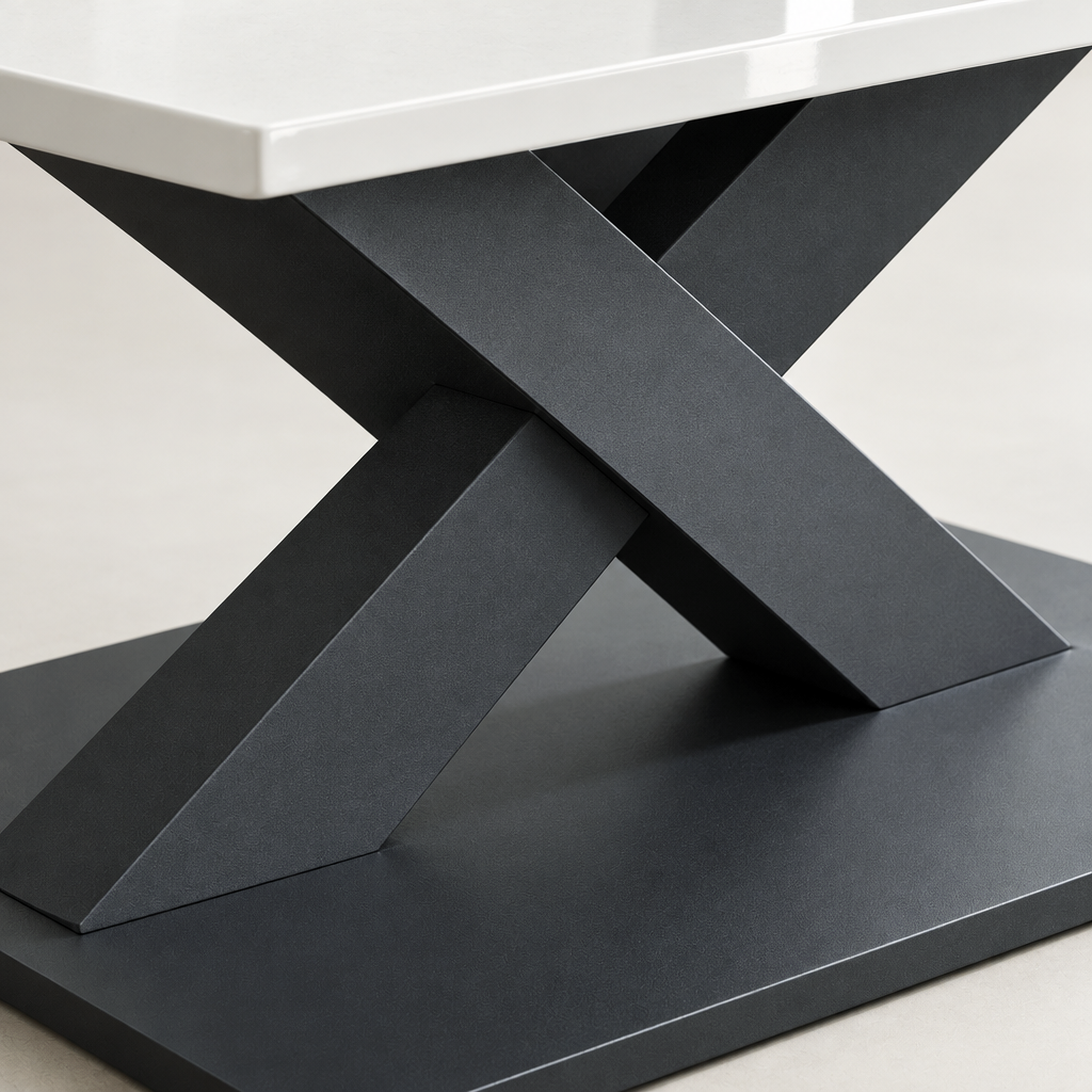 Close detail of the Kenzo Coffee Table's crossed charcoal grey base and the white gloss ceramic top edge