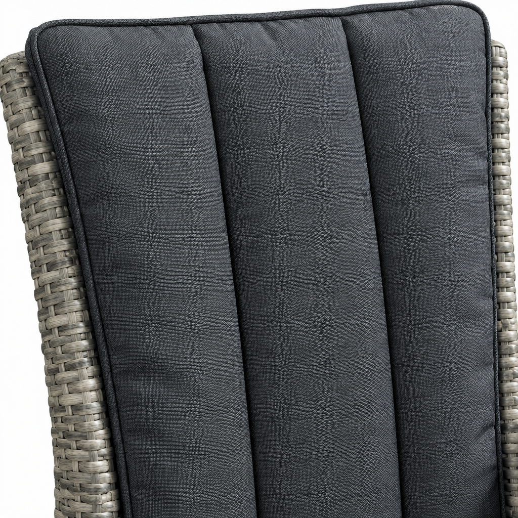 Close detail of a Palma Bistro Set chair back showing the charcoal padded cushion and the grey rattan weave