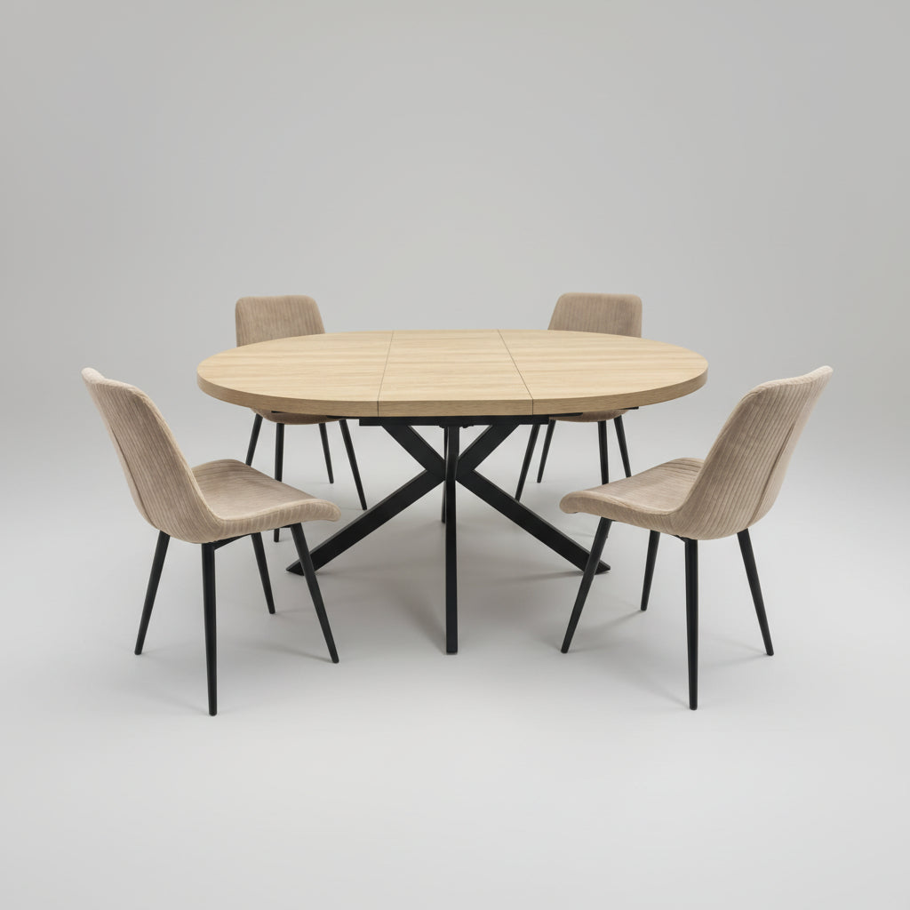 Extending Dining table with four chairs in a bright room with large windows.